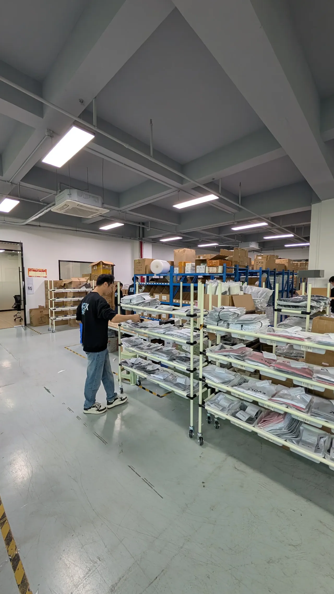Apex Hub team member scanning products in warehouse